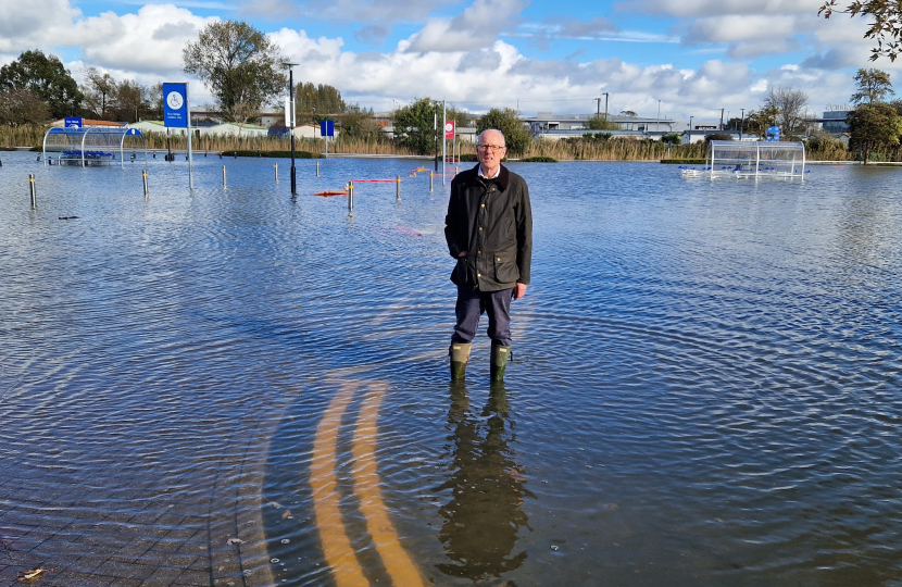 Nick Gibb flooding in Tesco car park